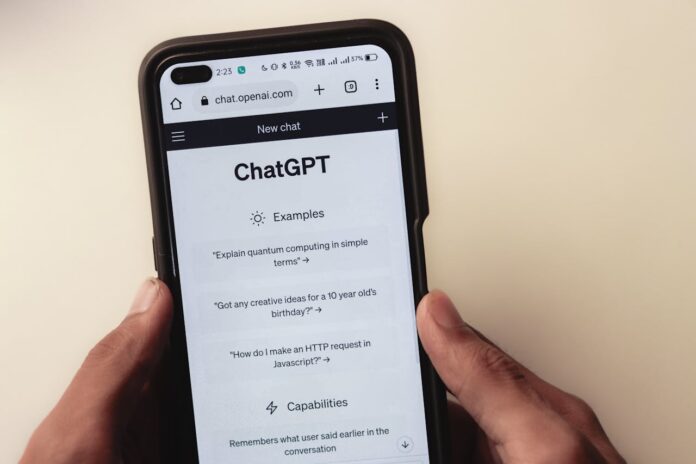 User viewing AI prompt examples on a smartphone in the ChatGPT app.